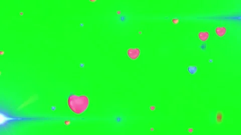 Floating pink hearts on green screen background with glowing blue lens flares Stock Footage 340940844