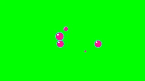 Floating pink liquid soap bubbles rising against a vibrant green background Stock Footage 340900348