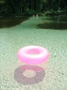 Floating pink rubber ring Stock Photos