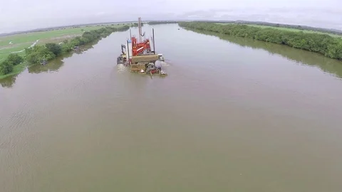 Floating platform of extraction on a water course in Africa. Aerial. Stock Footage 71256567