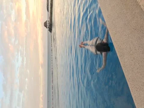 Floating In Pool Stock Photos