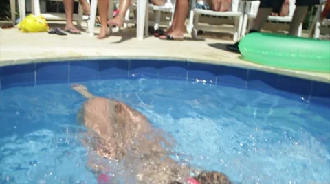 Floating on in the pool at the villa party Video stock 41566730