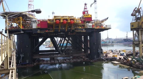 Floating production facility (oil rig platform) during renovation at shipyard Stock Footage 64803871