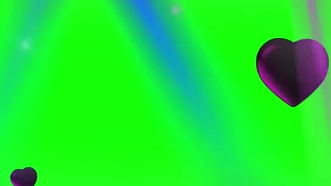 Floating purple hearts animated over green screen background with glowing light Stock Footage 345334001