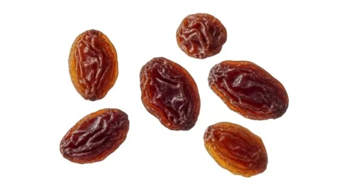 Floating raisins isolated on white Stock Footage 339340759