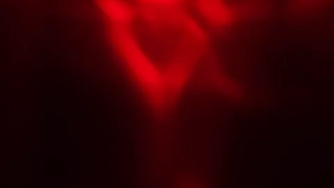 Floating red gas swirls in slow motion, forming abstract, organic shapes Stock Footage 309168258