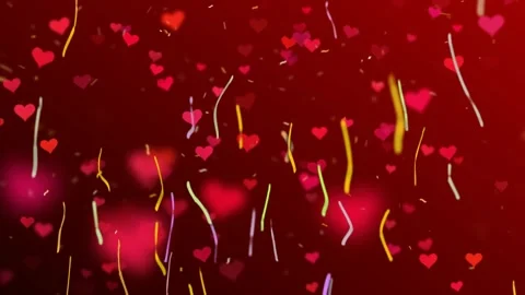 Floating red hearts and wavy golden confetti ribbons rising against dark 스톡 동영상 342119311