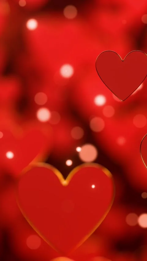 Floating Red Hearts on Blurred Background. Valentine's day. Vertical looped Stock Footage 308010448