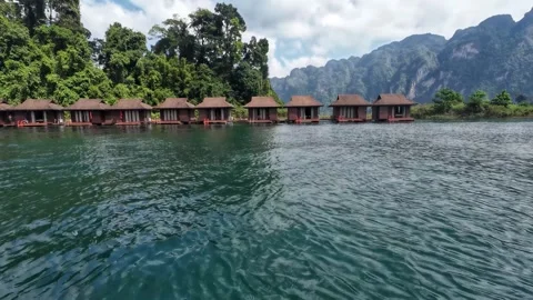 Floating Resort Along the Shore of Cheow Lan Lake Stock Footage 329074187
