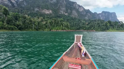 Floating Resort with Mountain Landscape on Cheow Lan Lake Stock Footage 329073679