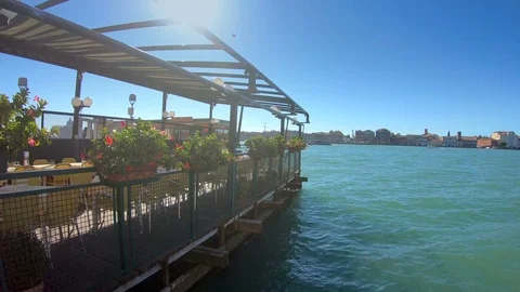 A floating restaurant with the flowers on the side Stock Footage 84960170