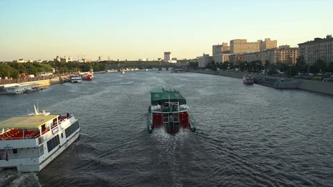Floating on the river boats,river walk,shooting from the bridge, summer evening. Stock Footage 112394055
