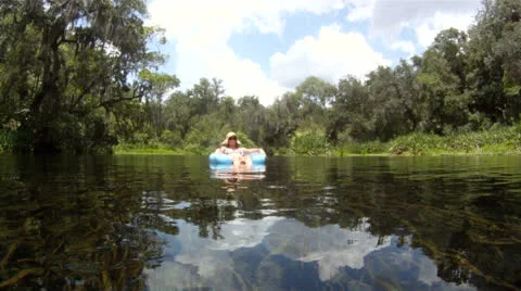 Floating on a River Stock Footage 25002190