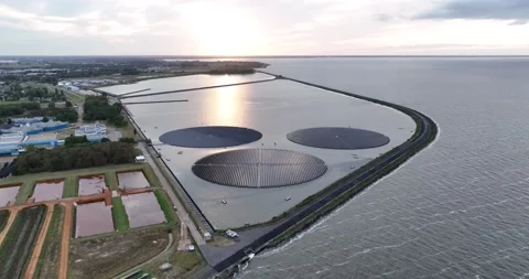 Floating rotating turnable solar panels. Large scale Sustainable energy Stock Footage 209981086