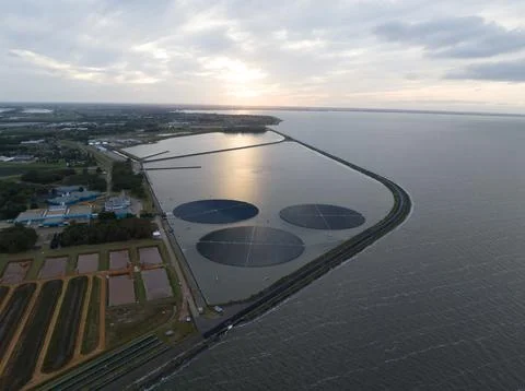 Floating rotating turnable solar panels. Large scale Sustainable energy Stock Photos