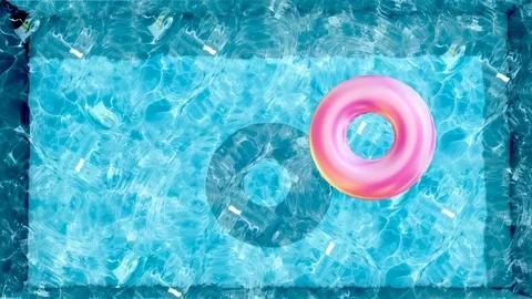 Floating rubber ring in water pool, Beach ball in swimming pool Stock Footage 80552888