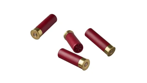 Floating shotgun shells isolated on white Stock Footage 339340868
