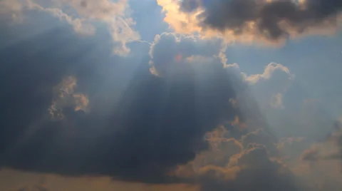 Floating in the sky storm clouds blocking the sun Stock Footage 27332785