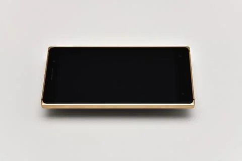 FLOATING SMARTPHONE ON WHITE BACKGROUND Stock Photos