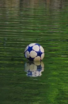 A floating soccer ball Stock Photos
