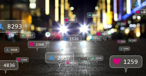 Floating social media notification bubbles above wet asphalt road at night, Stock Photos