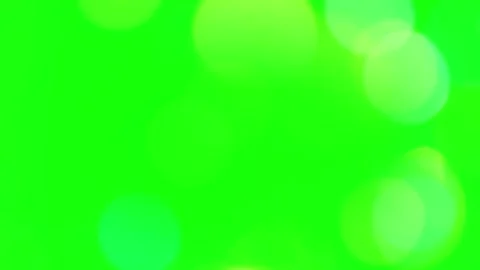 Floating soft green bokeh particles on vibrant chroma key background for Stock Footage 345217713