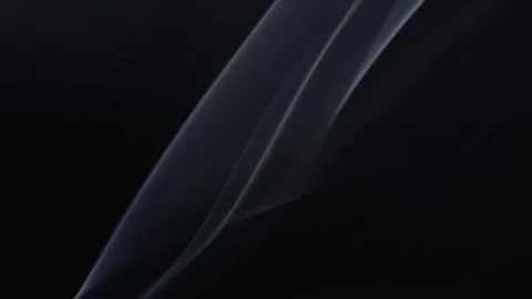 Floating soft smoke twisting in Isolated black background. Stock Footage 330634336