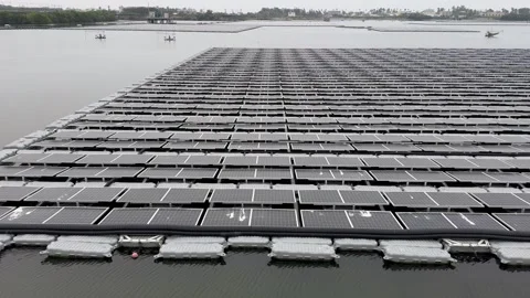 Floating Solar panel arrays over wetland water in Taiwan countryside. Stock Footage 266235824