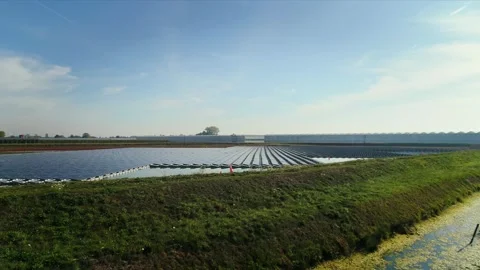 Floating solarpanels in a lake in the Netherlands Stock Footage 289908928