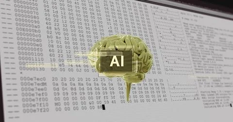 Floating stylized gold brain model hovering above monitor at desk, with HUD and 写真素材