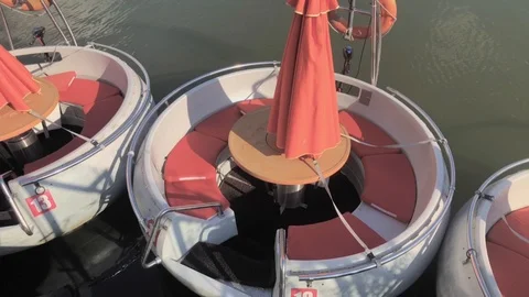 Floating tables docked by a river shore Stock Footage 95467923