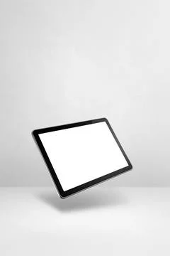 Floating tablet pc computer isolated on white. Vertical background Illustrazione stock