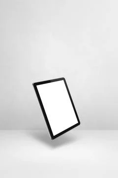 Floating tablet pc computer isolated on white. Vertical background Stock Illustration