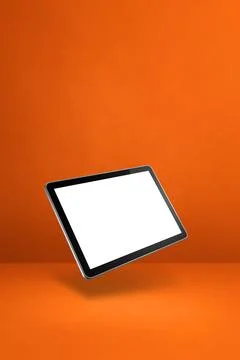 Floating tablet pc computer isolated on orange. Vertical background Stock Illustration
