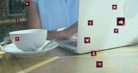 Floating tech icons appearing on laptop connecting while woman typing showing Stock Footage 318474865