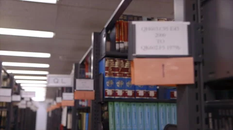 Floating through Library Shelves Stock Footage 50999770