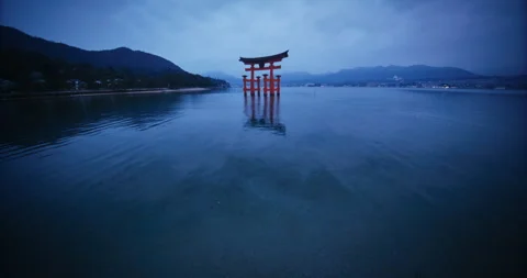 Floating Torii Gate at Dusk Miyajima Island Hiroshima Japan Video stock 344700013