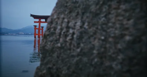 Floating Torii Gate Miyajima Japan Dusk Reveal Behind Rock Stock Footage 344700511