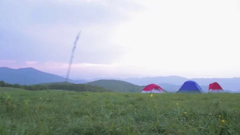 Floating Towards Tents Stock Footage 76030163