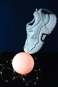 Floating trainer over the shing moon Stock Photos