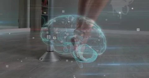 Floating translucent 3D brain hologram showing icons in studio, with support Foto stock
