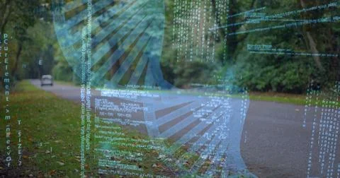 Floating translucent helix graphic merging code lines over rural forest road, 写真素材
