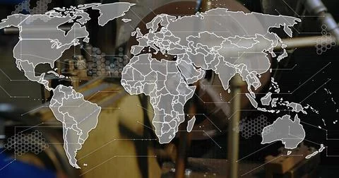 Floating translucent white-outline world map overlay in workshop, with hex HUD 写真素材