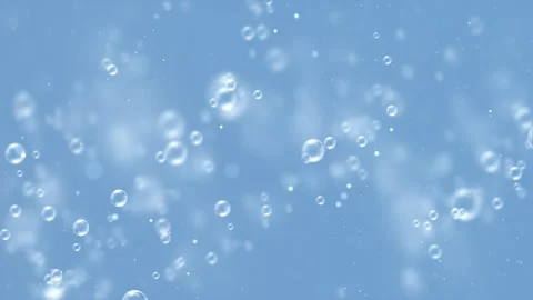 Floating Transparent Bubbles on a Clean Blue Background Stock Footage 338436554