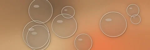Floating transparent glass bubbles over a caramel, beige and orange gradient, Stock Footage 340156516