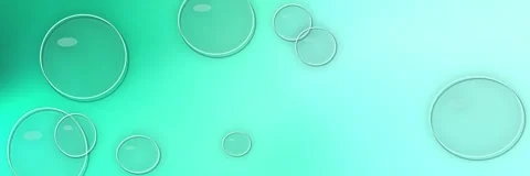 Floating transparent glass bubbles over a turquoise, mint and emerald gradient, Stock Footage 340156687