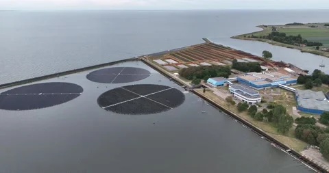 Floating turnable solar panels installation and sky. renewable energy source Stock Footage 211067699