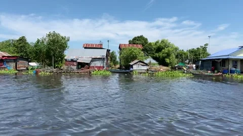 Floating village on the Sangkar River Stock Footage 341171172