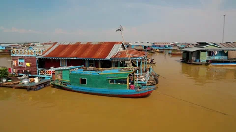 Floating village of Vietnamese refugees on Tonle Sap lake in Siem Reap, Cambodia Stock Footage