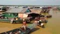 Floating village of Vietnamese refugees on Tonle Sap lake in Siem Reap, Cambodia HD Footage